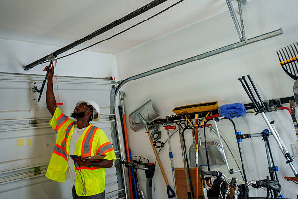 Professional Garage Door Panel Replacement technician working in Hurley, NM